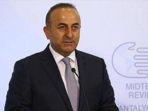Çavuşoğlu'ndan ABD askerlerinin YPG arması kullanmasına tepki