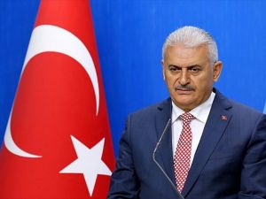 Başbakan Yıldırım, Galatasaray Kulüp Başkanı Özbek'i kutladı