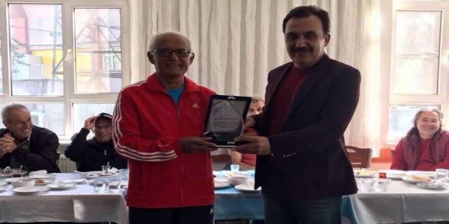 NECMETTİN ALTUĞUL’A ÖMER MÜDÜR'DEN PLAKET