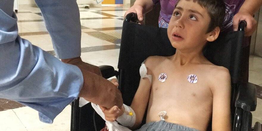 Halı yıkayan çocuk, başına isabet eden mermiyle yaralandı