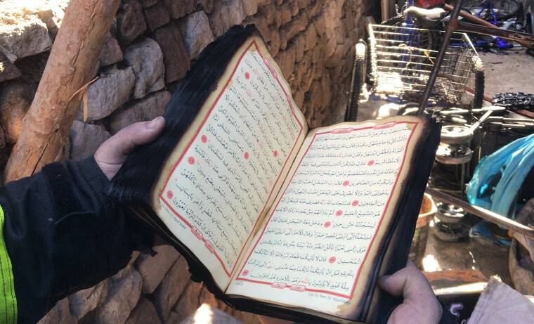 Konya'da evde çıkan yangında mushaf yanmadı
