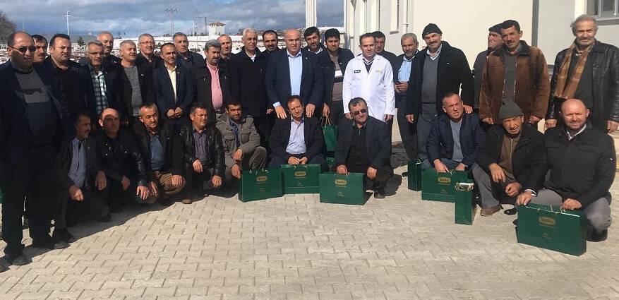 Karamanlı muhtarlar Torku'nun pekmez ve meyve suyu tesislerini gezdi