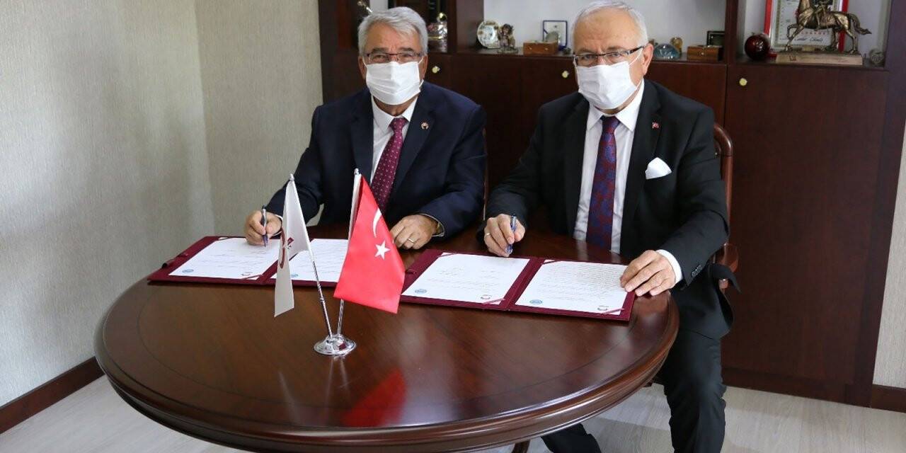 KMÜ ile KGTÜ arasında işbirliği protokolü