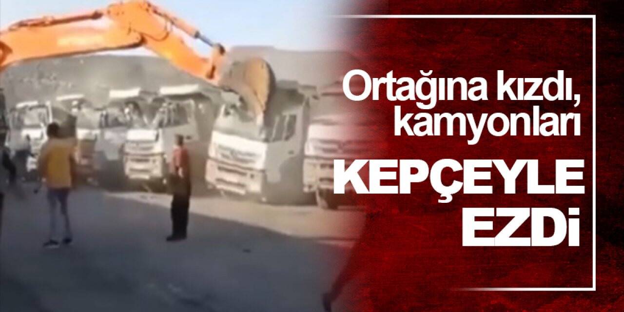 Ortağına kızdı, kamyonları kepçeyle ezdi