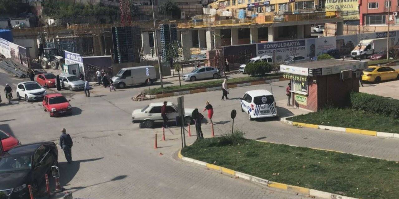 Tartıştığı kadının üzerine otomobilini sürdü
