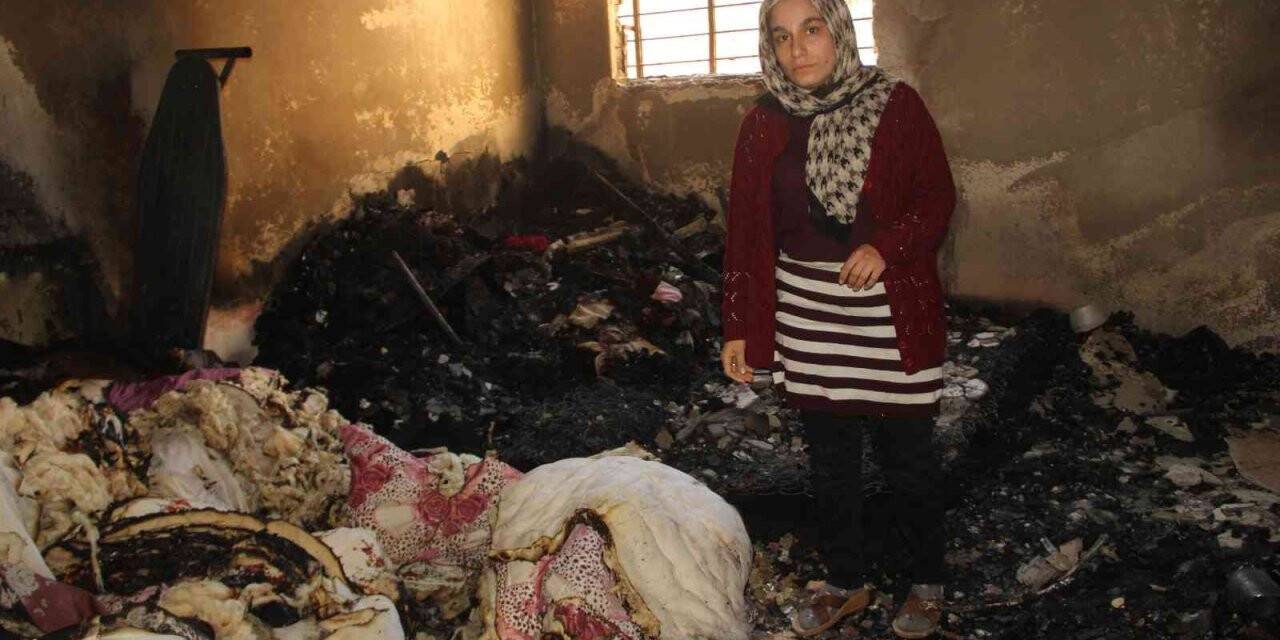 Evini ateşe veren adamı komşuları kurtardı
