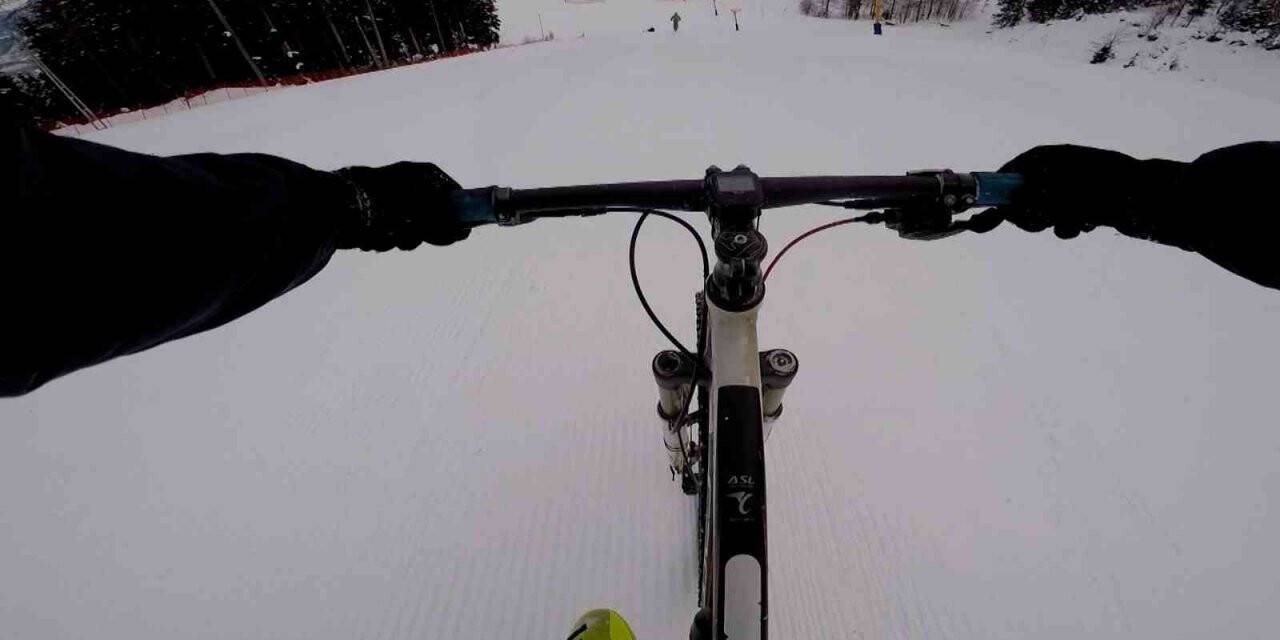 Bisikletleri ile bin 300 kilometrelik kayak pistinden aşağı indiler, o anları kayıt altına aldılar