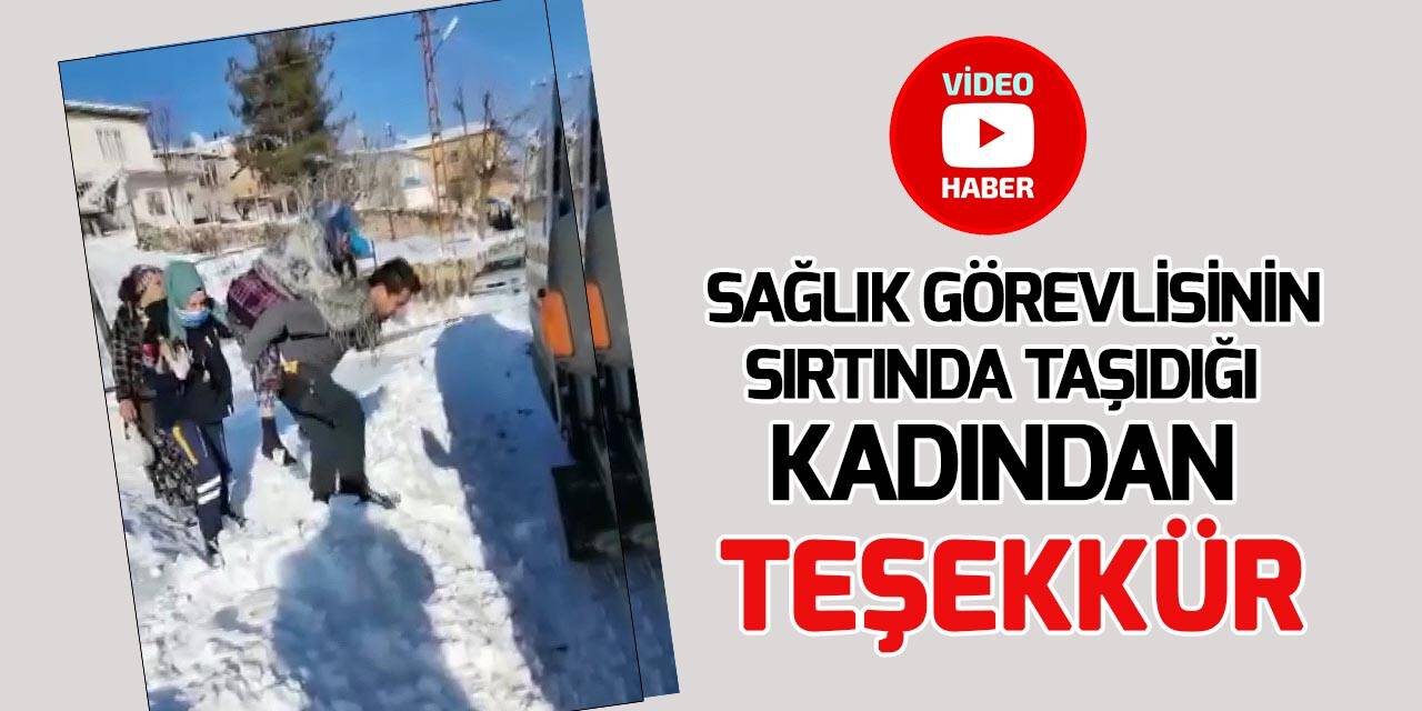 Sağlık görevlisinin sırtında taşıdığı kadından teşekkür