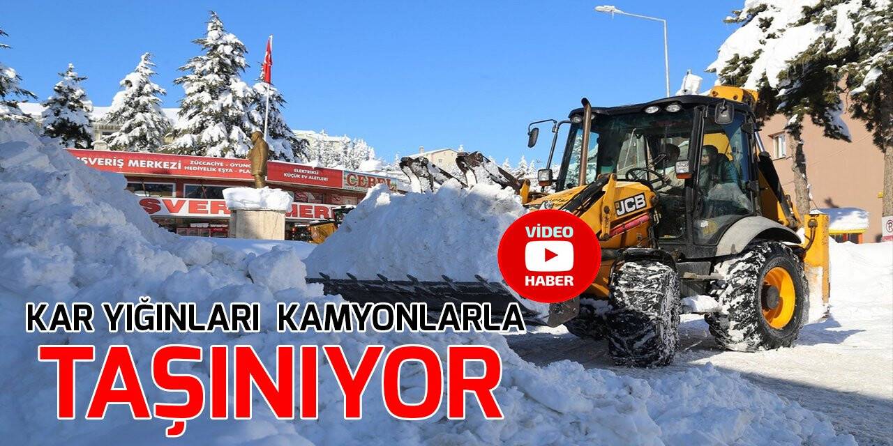 Kar yığınları kamyonlarla taşınıyor