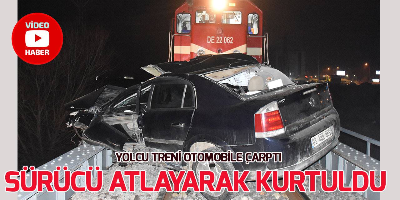 Trenin çarptığı otomobilin sürücüsü canını araçtan son anda atlayarak kurtardı