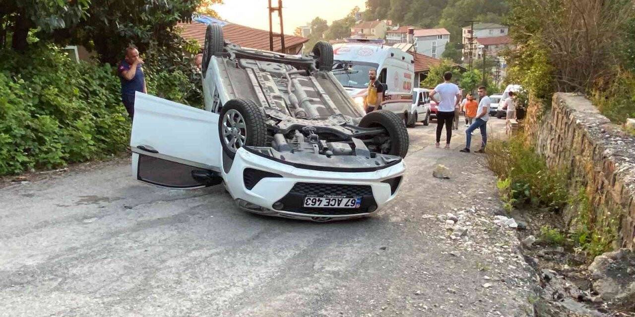 Takla atan araçtan yara almadan kurtuldular