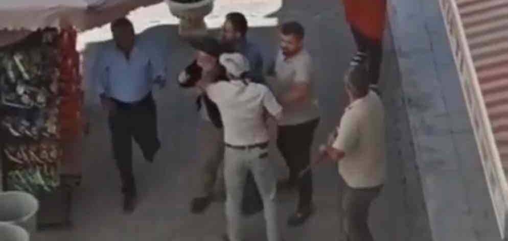 Tartıştığı akrabasının dükkanına kurşun yağdırdı