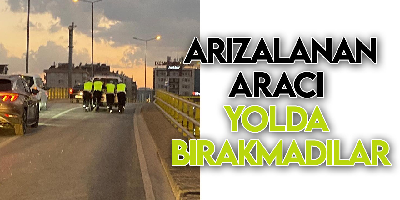Konya'da trafik polisleri arızalanan aracı yol kenarına kadar ittiler