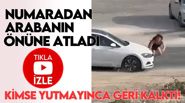 Numaradan arabanın önüne atladı: Kimse yutmayınca geri kalktı!