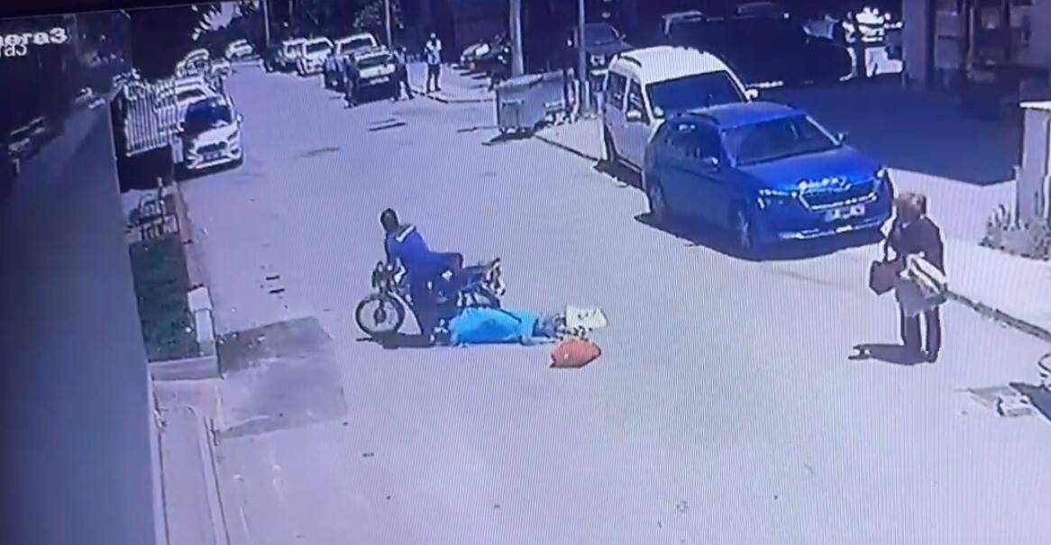 Eteği motosiklete takılan kadın yerde sürüklendi
