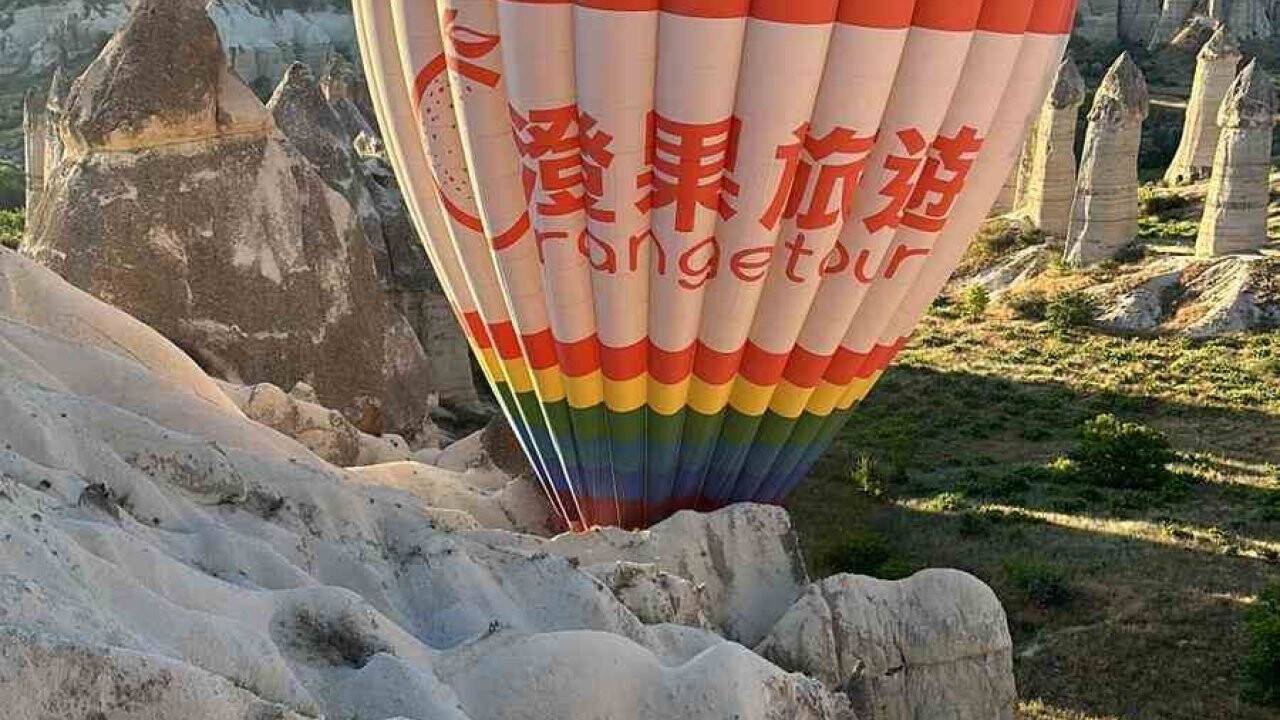 Balon pilotu 20 kişinin hayatını kurtardı