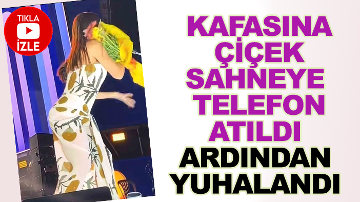 Konserde kafasına çiçek, sahneye yelefon atılan Simge Sağın sonra da yuhalandı