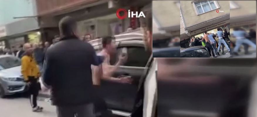 İki grup arasında kavga çıktı, eline geçirdiği kaldırım taşını böyle fırlattı (VİDEOLU)