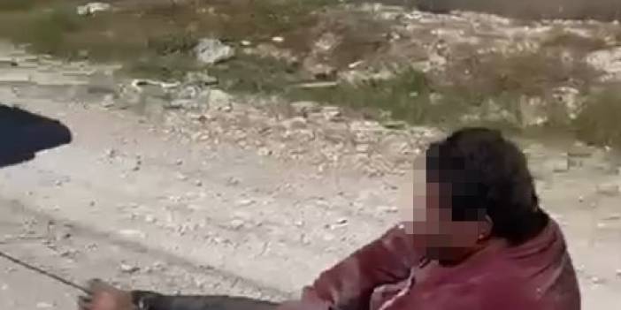 Köpeğine zarar veren adamı otomobile bağlayıp sürükledi