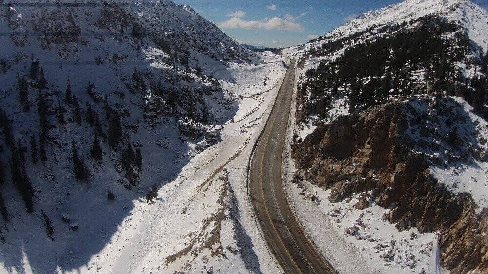 Karla buluşan Antalya-Konya karayolunda  kartpostallık görüntüler