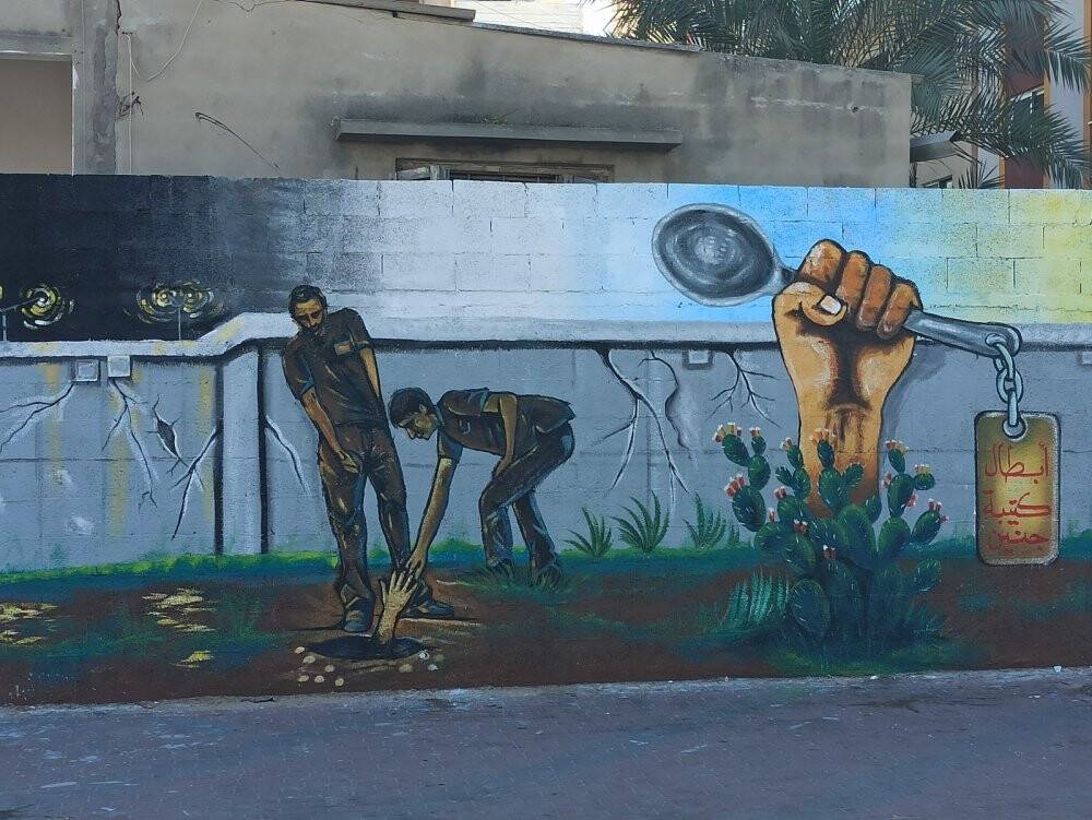 Gazze’de İsrail hapishanelerinden kaçan Filistinlilerin yüzleri duvara resmedildi