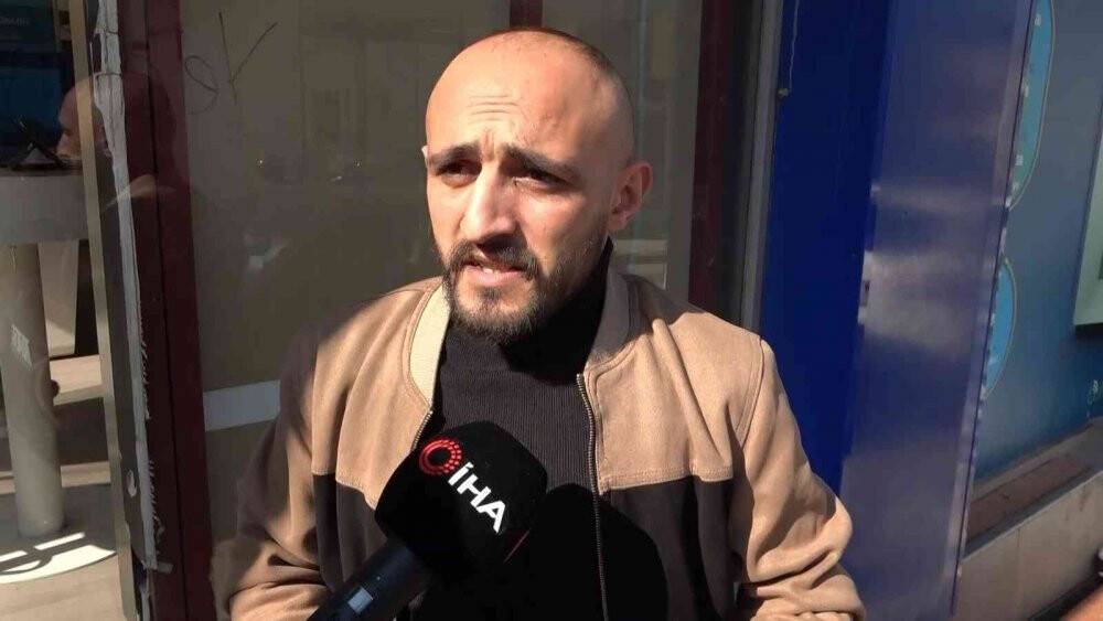 Taşla camını kırdığı telefon mağazasını 1 dakikada soydu