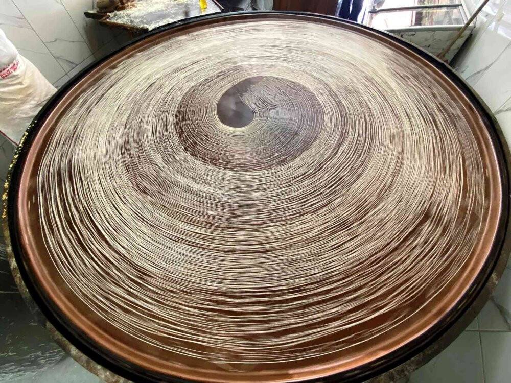 Konya'da geleneksel yöntemlerle üretilen tel kadayıf sofraları tatlandırıyor