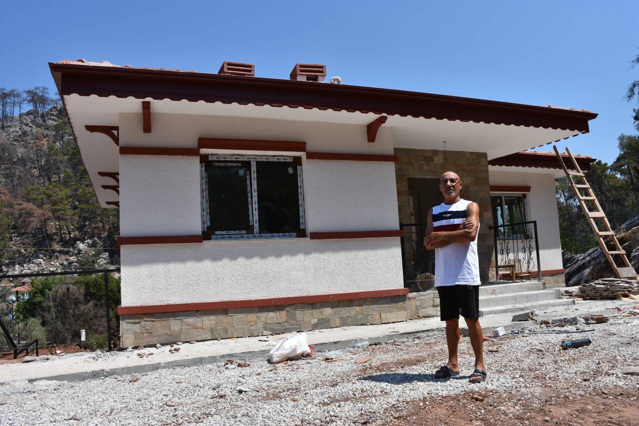 aa-20220807-28589257-28589247-marmariste-gecen-seneki-yanginda-zarar-gorenler-yeni-evlerine-kavusuyor.jpg