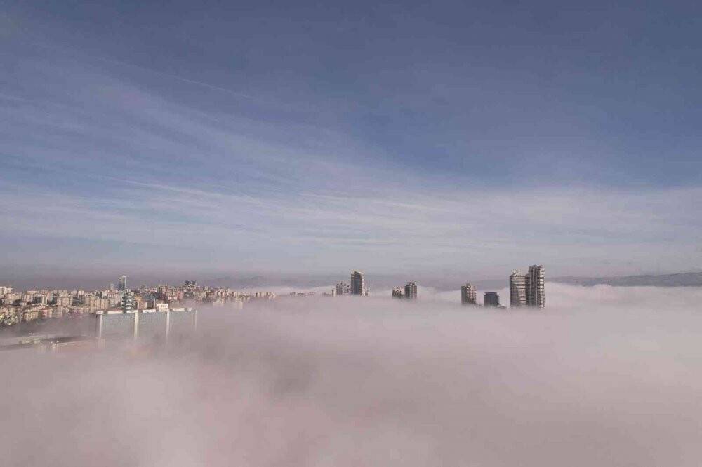 Ankara'da karpostallık manzaralar oluşturan sis  görüntülendi