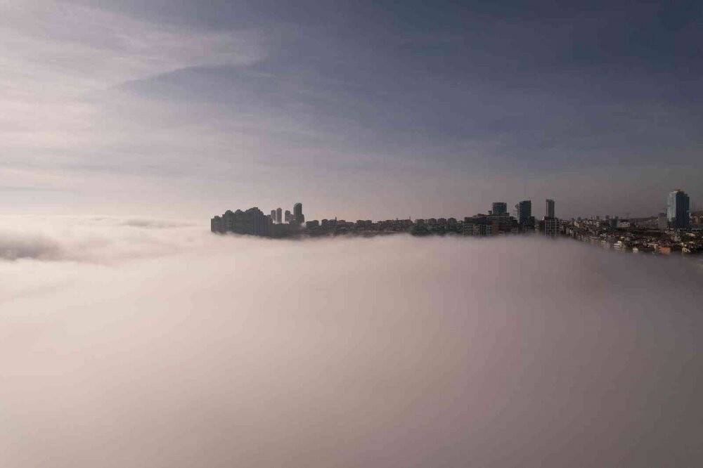 Ankara'da karpostallık manzaralar oluşturan sis  görüntülendi