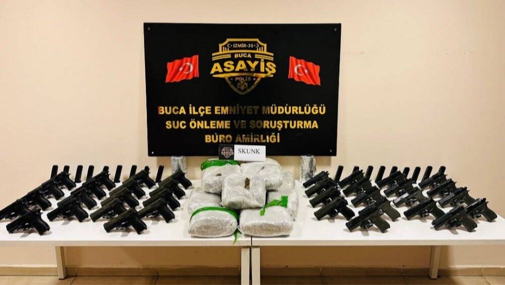 Silah kaçakçılarının evinde 13 kilo uyuşturucu ele geçirildi