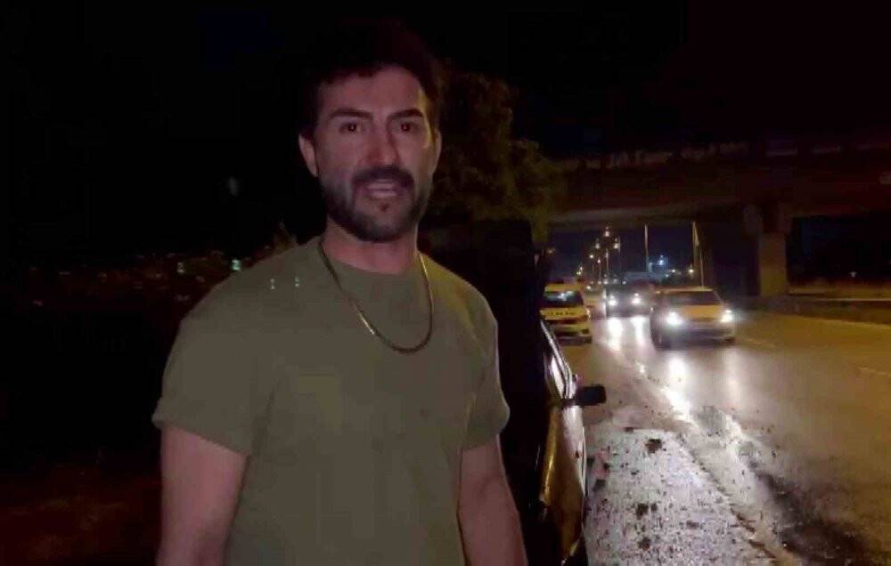 Otomobilinin yanışını çaresizce izledi