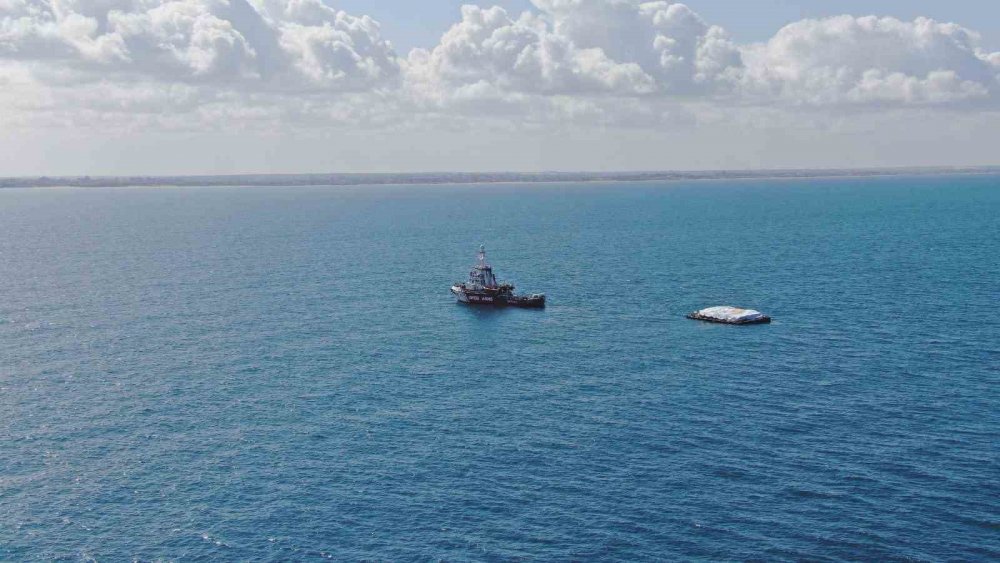 Gazze’ye ulaşan gemideki yardımlar kamyonlara yüklendi